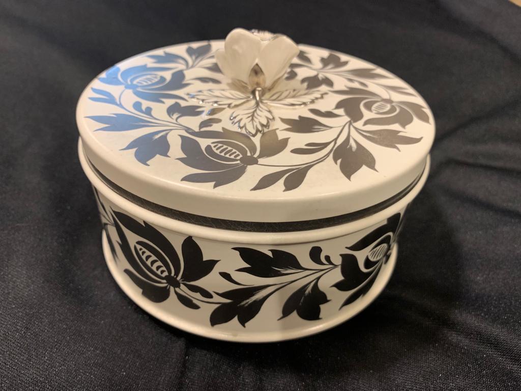 Wedgwood, circular covered box, floral finial, moonstone body, floral platinum lustre decoration, design by Millicent Taplin, circa 1950